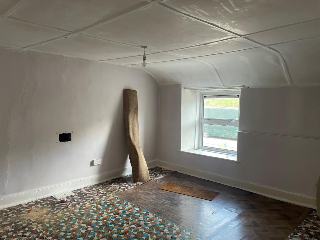 Lot: 102 - HOUSE FOR IMPROVEMENT - First floor bedroom with partly carpeted floor